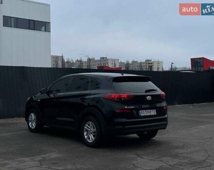 Черный Хендай Туксон, объемом двигателя 2 л и пробегом 115 тыс. км за 18000 $, фото 2 на Automoto.ua