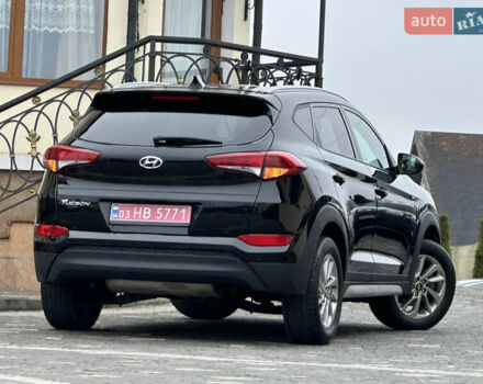 Черный Хендай Туксон, объемом двигателя 2 л и пробегом 156 тыс. км за 12800 $, фото 62 на Automoto.ua