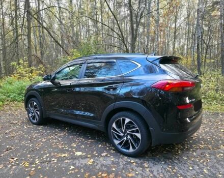 Чорний Хендай Туксон, об'ємом двигуна 2 л та пробігом 135 тис. км за 13500 $, фото 6 на Automoto.ua