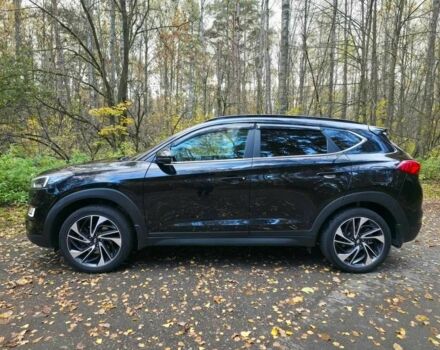 Чорний Хендай Туксон, об'ємом двигуна 2 л та пробігом 135 тис. км за 13500 $, фото 7 на Automoto.ua