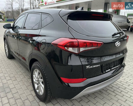 Черный Хендай Туксон, объемом двигателя 1.69 л и пробегом 134 тыс. км за 21800 $, фото 12 на Automoto.ua