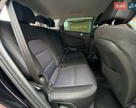 Черный Хендай Туксон, объемом двигателя 2 л и пробегом 106 тыс. км за 19500 $, фото 16 на Automoto.ua