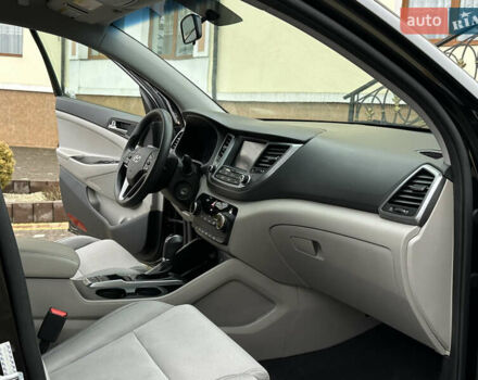 Черный Хендай Туксон, объемом двигателя 2 л и пробегом 156 тыс. км за 12800 $, фото 69 на Automoto.ua