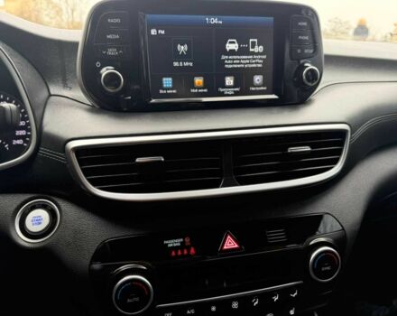 Чорний Хендай Туксон, об'ємом двигуна 2 л та пробігом 70 тис. км за 23000 $, фото 1 на Automoto.ua