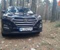 Черный Хендай Туксон, объемом двигателя 2 л и пробегом 100 тыс. км за 17200 $, фото 1 на Automoto.ua