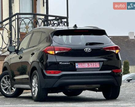 Черный Хендай Туксон, объемом двигателя 2 л и пробегом 156 тыс. км за 12800 $, фото 34 на Automoto.ua