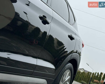 Черный Хендай Туксон, объемом двигателя 2 л и пробегом 156 тыс. км за 12800 $, фото 11 на Automoto.ua