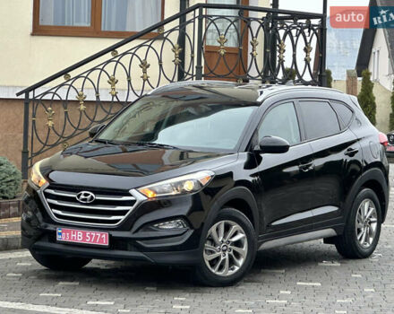 Черный Хендай Туксон, объемом двигателя 2 л и пробегом 156 тыс. км за 12800 $, фото 17 на Automoto.ua