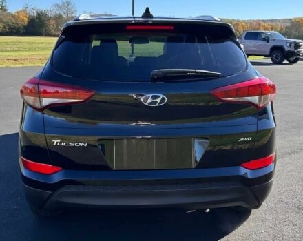 Чорний Хендай Туксон, об'ємом двигуна 2 л та пробігом 48 тис. км за 10800 $, фото 5 на Automoto.ua