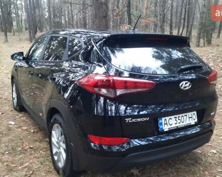 Черный Хендай Туксон, объемом двигателя 2 л и пробегом 100 тыс. км за 17200 $, фото 1 на Automoto.ua