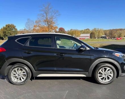 Чорний Хендай Туксон, об'ємом двигуна 2 л та пробігом 48 тис. км за 10800 $, фото 7 на Automoto.ua