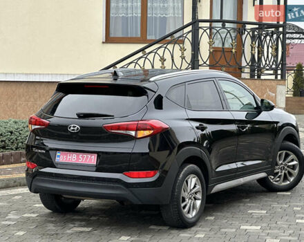 Черный Хендай Туксон, объемом двигателя 2 л и пробегом 156 тыс. км за 12800 $, фото 51 на Automoto.ua