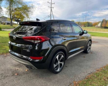 Черный Хендай Туксон, объемом двигателя 1.6 л и пробегом 34 тыс. км за 19000 $, фото 5 на Automoto.ua