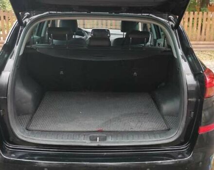 Чорний Хендай Туксон, об'ємом двигуна 2 л та пробігом 91 тис. км за 25000 $, фото 3 на Automoto.ua