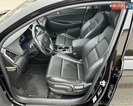 Черный Хендай Туксон, объемом двигателя 1.69 л и пробегом 134 тыс. км за 21800 $, фото 19 на Automoto.ua