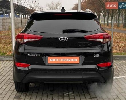 Черный Хендай Туксон, объемом двигателя 2 л и пробегом 106 тыс. км за 19500 $, фото 6 на Automoto.ua
