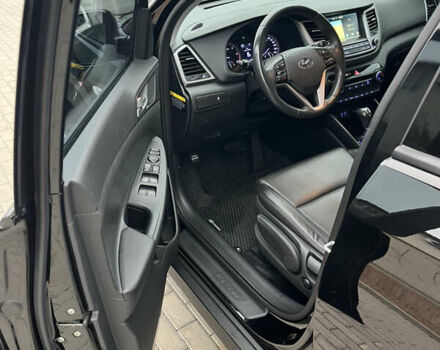 Черный Хендай Туксон, объемом двигателя 1.69 л и пробегом 134 тыс. км за 21800 $, фото 17 на Automoto.ua