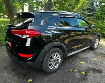 Черный Хендай Туксон, объемом двигателя 2 л и пробегом 109 тыс. км за 18490 $, фото 4 на Automoto.ua