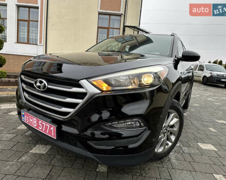 Черный Хендай Туксон, объемом двигателя 2 л и пробегом 156 тыс. км за 12800 $, фото 14 на Automoto.ua