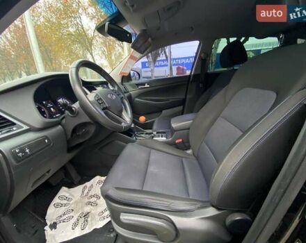 Черный Хендай Туксон, объемом двигателя 2 л и пробегом 106 тыс. км за 19500 $, фото 10 на Automoto.ua