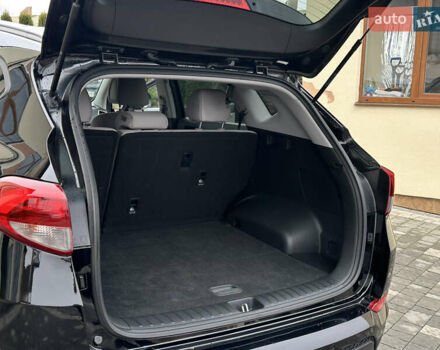 Черный Хендай Туксон, объемом двигателя 2 л и пробегом 156 тыс. км за 12800 $, фото 84 на Automoto.ua