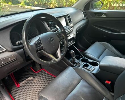 Черный Хендай Туксон, объемом двигателя 2 л и пробегом 109 тыс. км за 18490 $, фото 11 на Automoto.ua