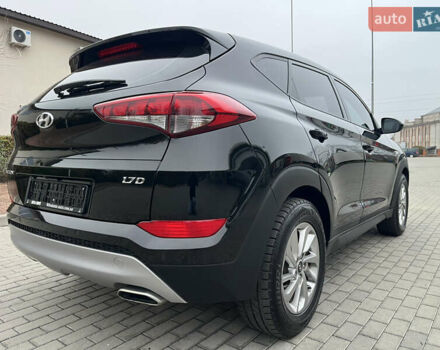 Черный Хендай Туксон, объемом двигателя 1.69 л и пробегом 134 тыс. км за 21800 $, фото 14 на Automoto.ua