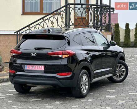 Черный Хендай Туксон, объемом двигателя 2 л и пробегом 156 тыс. км за 12800 $, фото 61 на Automoto.ua