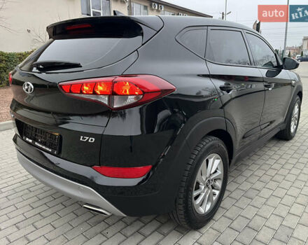 Черный Хендай Туксон, объемом двигателя 1.69 л и пробегом 134 тыс. км за 21800 $, фото 11 на Automoto.ua