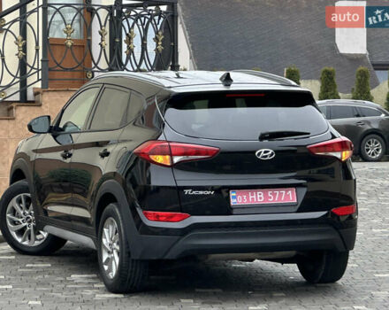 Черный Хендай Туксон, объемом двигателя 2 л и пробегом 156 тыс. км за 12800 $, фото 19 на Automoto.ua