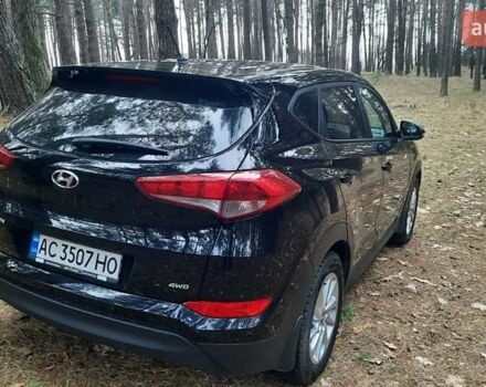 Черный Хендай Туксон, объемом двигателя 2 л и пробегом 100 тыс. км за 17200 $, фото 4 на Automoto.ua