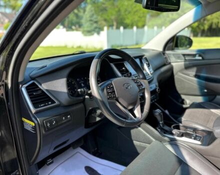 Чорний Хендай Туксон, об'ємом двигуна 1.6 л та пробігом 80 тис. км за 13100 $, фото 7 на Automoto.ua