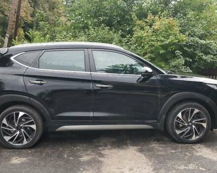 Чорний Хендай Туксон, об'ємом двигуна 2 л та пробігом 91 тис. км за 25000 $, фото 4 на Automoto.ua