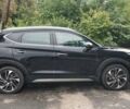Чорний Хендай Туксон, об'ємом двигуна 2 л та пробігом 91 тис. км за 25000 $, фото 4 на Automoto.ua
