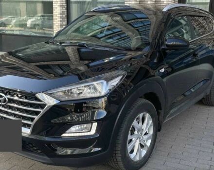 Черный Хендай Туксон, объемом двигателя 2 л и пробегом 119 тыс. км за 9900 $, фото 2 на Automoto.ua