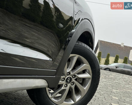 Черный Хендай Туксон, объемом двигателя 2 л и пробегом 156 тыс. км за 12800 $, фото 54 на Automoto.ua
