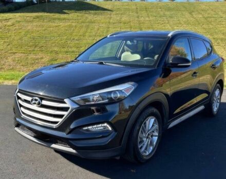 Чорний Хендай Туксон, об'ємом двигуна 2 л та пробігом 48 тис. км за 10800 $, фото 2 на Automoto.ua