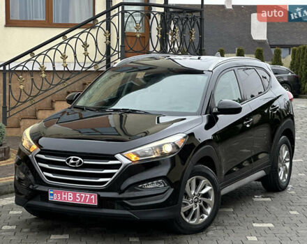 Черный Хендай Туксон, объемом двигателя 2 л и пробегом 156 тыс. км за 12800 $, фото 7 на Automoto.ua