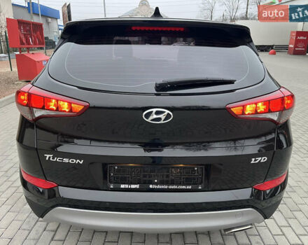 Черный Хендай Туксон, объемом двигателя 1.69 л и пробегом 134 тыс. км за 21800 $, фото 9 на Automoto.ua