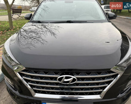 Черный Хендай Туксон, объемом двигателя 2 л и пробегом 70 тыс. км за 23000 $, фото 4 на Automoto.ua