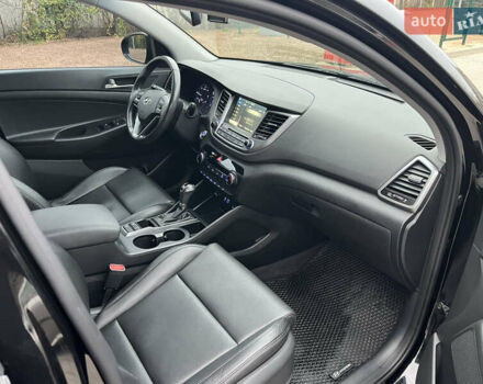 Черный Хендай Туксон, объемом двигателя 1.69 л и пробегом 134 тыс. км за 21800 $, фото 27 на Automoto.ua