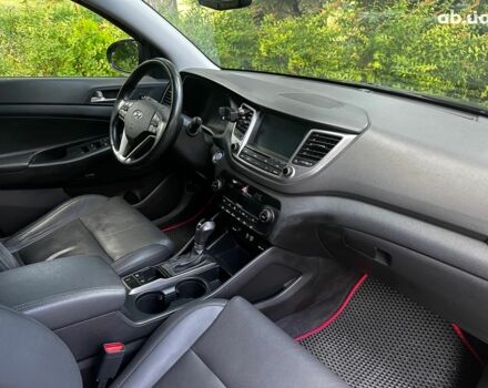 Черный Хендай Туксон, объемом двигателя 2 л и пробегом 109 тыс. км за 18490 $, фото 25 на Automoto.ua