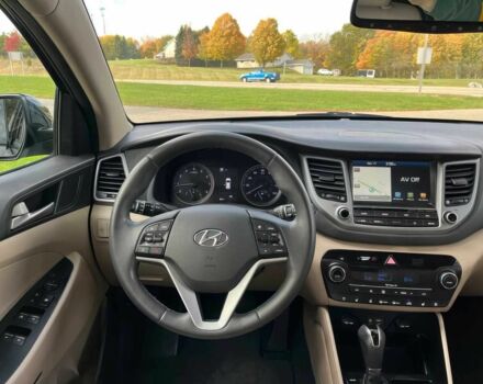 Черный Хендай Туксон, объемом двигателя 1.6 л и пробегом 34 тыс. км за 19000 $, фото 11 на Automoto.ua