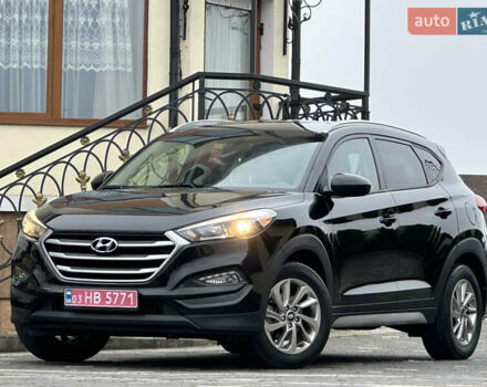 Черный Хендай Туксон, объемом двигателя 2 л и пробегом 156 тыс. км за 12800 $, фото 3 на Automoto.ua