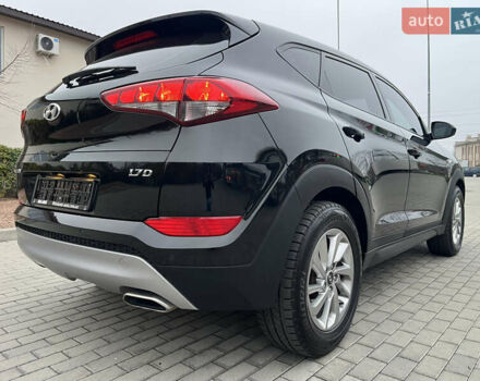 Черный Хендай Туксон, объемом двигателя 1.69 л и пробегом 134 тыс. км за 21800 $, фото 10 на Automoto.ua