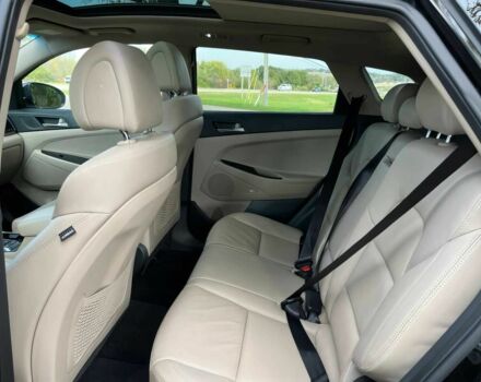 Черный Хендай Туксон, объемом двигателя 1.6 л и пробегом 34 тыс. км за 19000 $, фото 13 на Automoto.ua