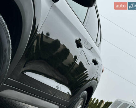 Черный Хендай Туксон, объемом двигателя 2 л и пробегом 156 тыс. км за 12800 $, фото 13 на Automoto.ua