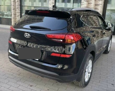 Черный Хендай Туксон, объемом двигателя 2 л и пробегом 119 тыс. км за 9900 $, фото 1 на Automoto.ua