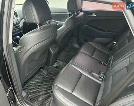 Черный Хендай Туксон, объемом двигателя 1.69 л и пробегом 134 тыс. км за 21800 $, фото 23 на Automoto.ua