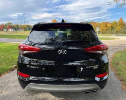 Черный Хендай Туксон, объемом двигателя 1.6 л и пробегом 34 тыс. км за 19000 $, фото 4 на Automoto.ua